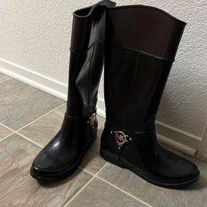 Black and brown Michael Kors rain boots